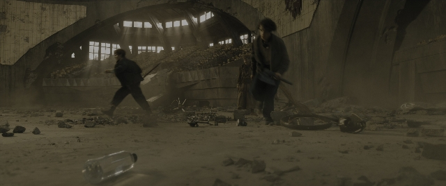 Wide shot frame from The Hunger Games: The Ballad of Songbirds & Snakes — walking, person