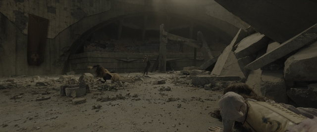Wide shot frame from The Hunger Games: The Ballad of Songbirds & Snakes — standing, person