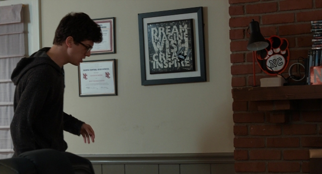 Wide shot frame from The Fault in Our Stars — standing, room, lamp
