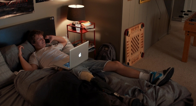 Wide shot frame from The Fault in Our Stars — book, room, table