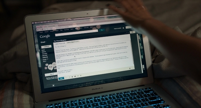 Frame from The Fault in Our Stars — sitting, bed, hand