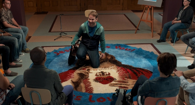 Wide shot frame from The Fault in Our Stars — sitting, room, dialogue