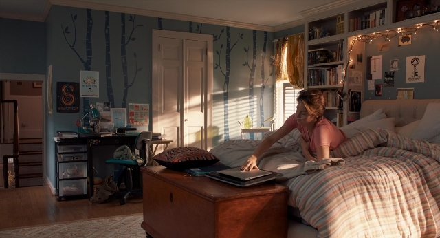 Wide shot frame from The Fault in Our Stars — room, bed, door