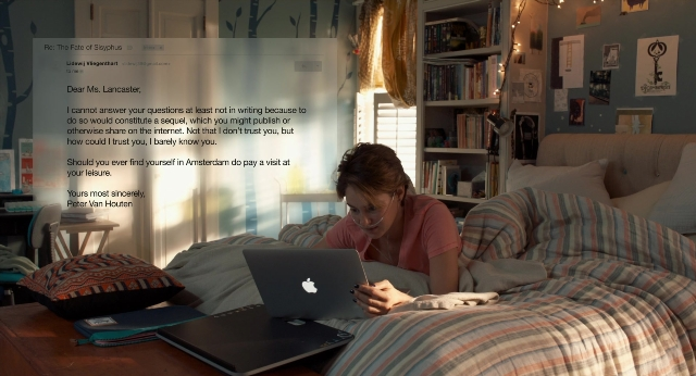 Wide shot frame from The Fault in Our Stars — sitting, book, table