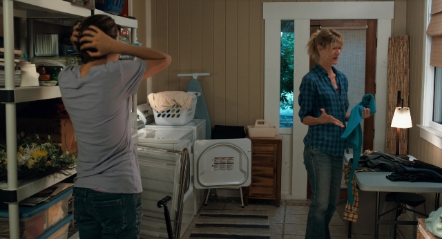 Wide shot frame from The Fault in Our Stars — standing, room, hand