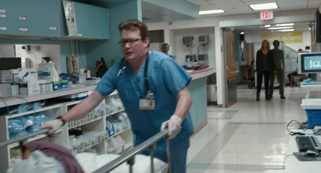 Medium shot frame from The Fault in Our Stars — dialogue, bed, hand