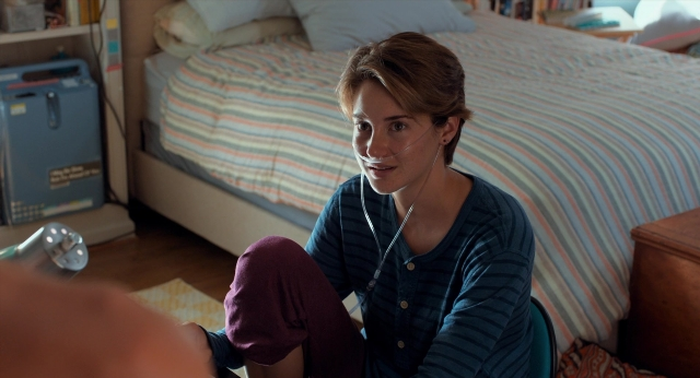 Frame from The Fault in Our Stars — sitting, room, bed