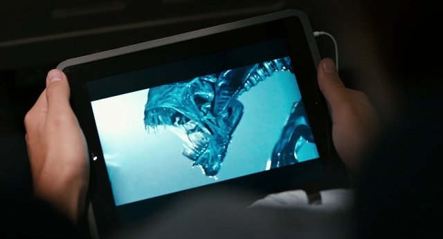 Wide shot frame from The Fault in Our Stars — person, tablet computer