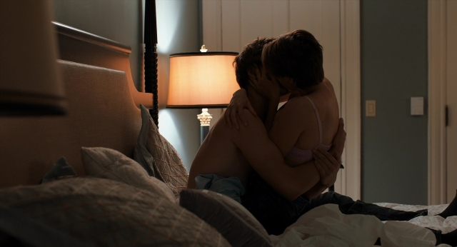 Wide shot frame from The Fault in Our Stars — sitting, room, bed