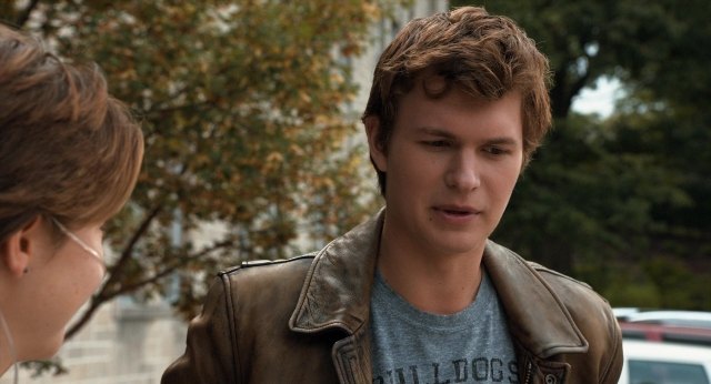 Medium shot frame from The Fault in Our Stars — standing, street, shirt