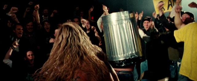 Wide shot frame from The Wrestler — night, person, human face