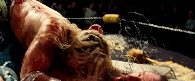 Wide shot frame from The Wrestler — person, human face