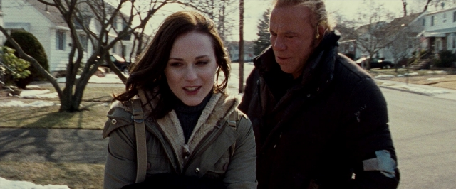 Wide shot frame from The Wrestler — walking, dialogue, street