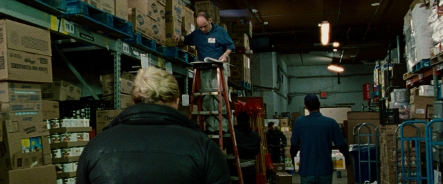 Wide shot frame from The Wrestler — standing, uniform, person