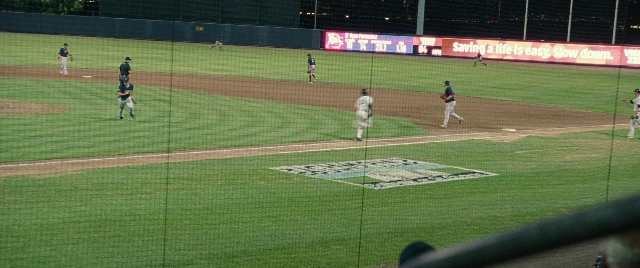 Wide shot frame from The King of Staten Island — uniform, person