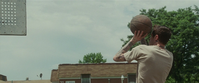 Frame from The King of Staten Island — ball, person, window