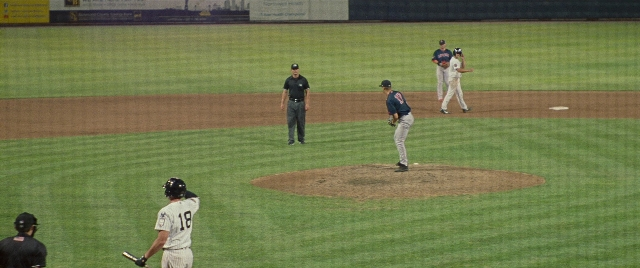 Wide shot frame from The King of Staten Island — standing, plate, uniform