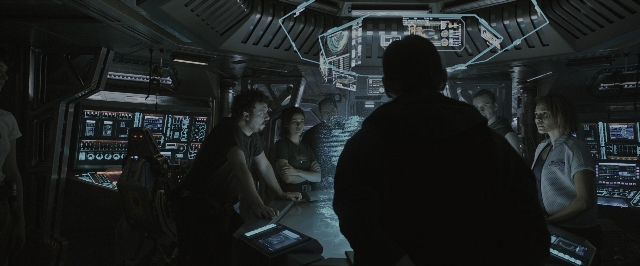Wide shot frame from Alien: Covenant — standing, room, dialogue