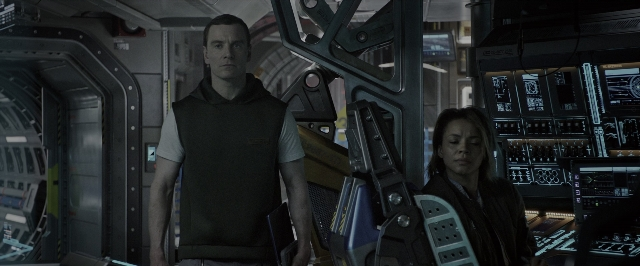 Wide shot frame from Alien: Covenant — standing, room, bag