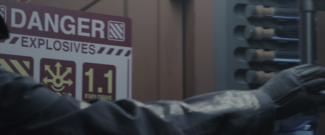 Wide shot frame from Alien: Covenant — room, bed, person