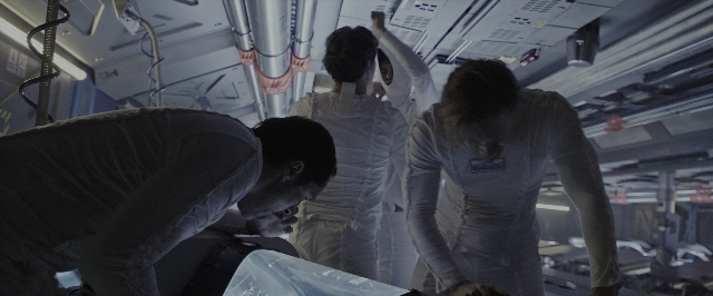 Wide shot frame from Alien: Covenant — standing, person, human face