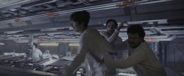 Wide shot frame from Alien: Covenant — standing, dialogue, shirt
