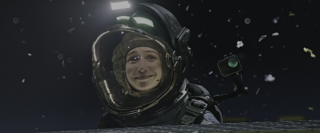 Wide shot frame from Alien: Covenant — standing, hat, suit