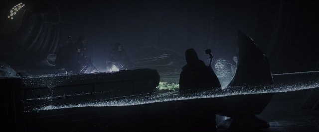 Wide shot frame from Alien: Covenant — standing, room, water