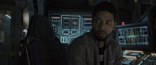 Medium shot frame from Alien: Covenant — sitting, room, night