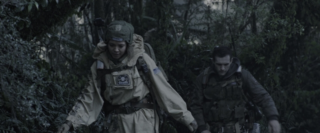 Wide shot frame from Alien: Covenant — walking, face, forest