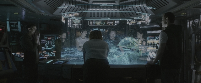 Wide shot frame from Alien: Covenant — sitting, standing, room