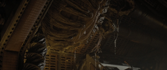 Wide shot frame from Alien: Romulus — building
