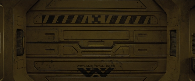 Wide shot frame from Alien: Romulus — door, car, land vehicle