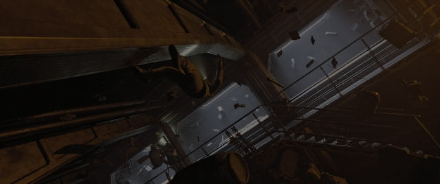 Wide shot frame from Alien: Romulus — room, person, window