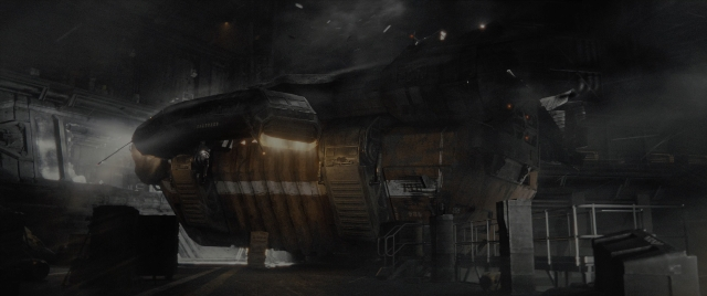 Wide shot frame from Alien: Romulus — room, car, smoke