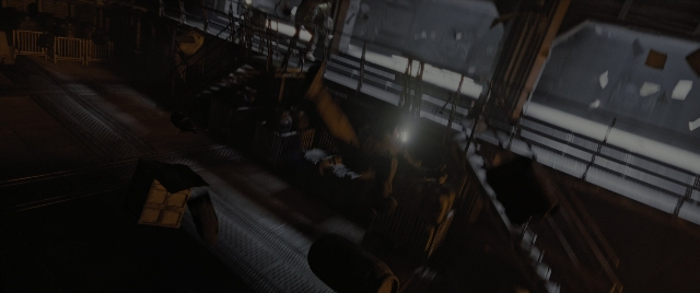 Wide shot frame from Alien: Romulus — night, train, person