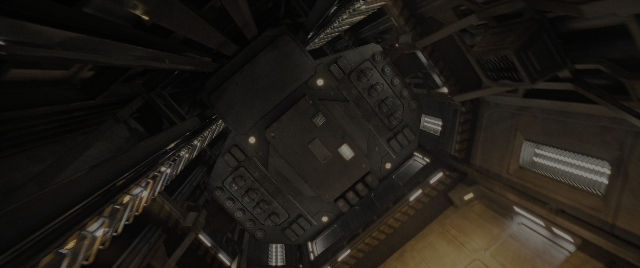 Wide shot frame from Alien: Romulus — room, window, running