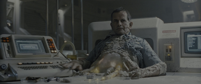 Wide shot frame from Alien: Romulus — sitting, face, hair