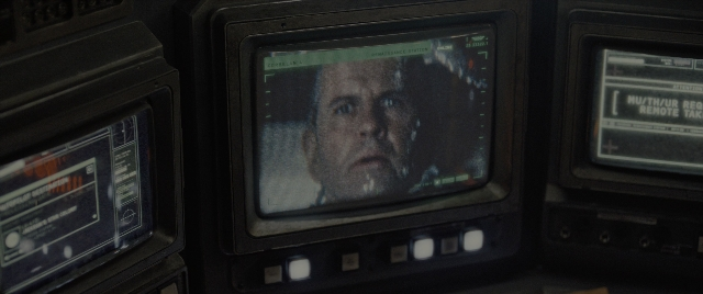 Medium shot frame from Alien: Romulus — room, television, face