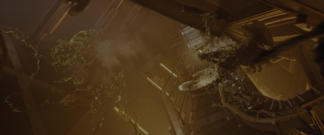 Wide shot frame from Alien: Romulus — smoke, window, running