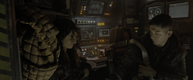 Wide shot frame from Alien: Romulus — sitting, face, boat
