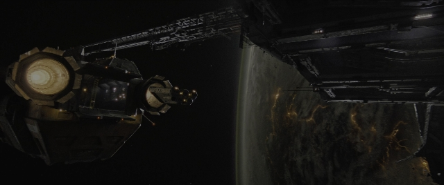 Wide shot frame from Alien: Romulus — car, night