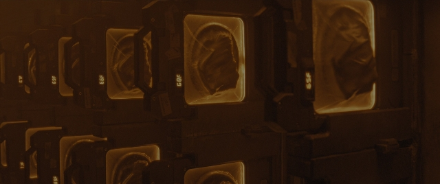 Wide shot frame from Alien: Romulus — room, window, traffic light