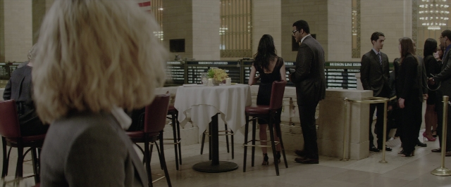 Wide shot frame from Teenage Mutant Ninja Turtles: Out of the Shadows — sitting, standing, room
