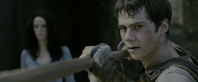 Medium shot frame from The Maze Runner — hand, face, hair