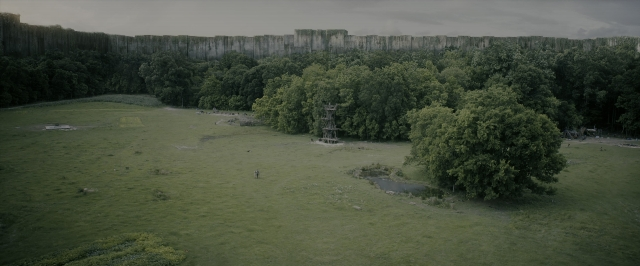 Wide shot frame from The Maze Runner — castle