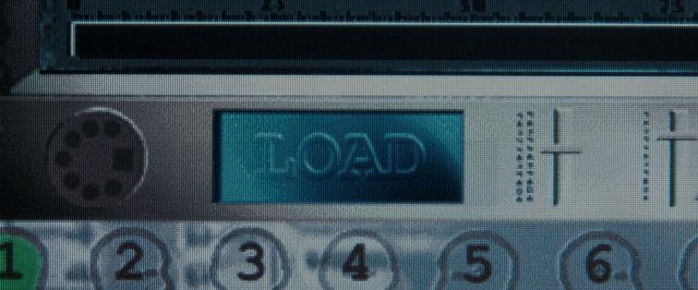 Frame from The Matrix — digital clock