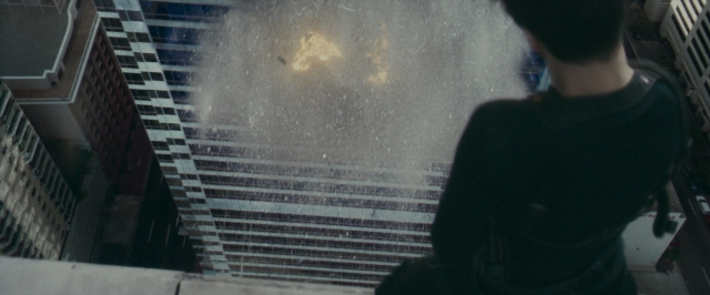 Wide shot frame from The Matrix — standing, shirt, water