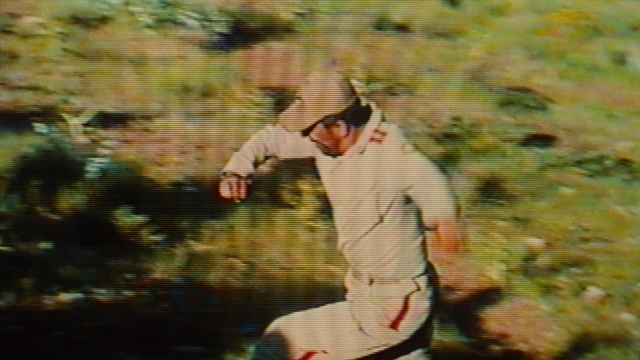 Frame from Ta'm e guilass — suit, person, human face
