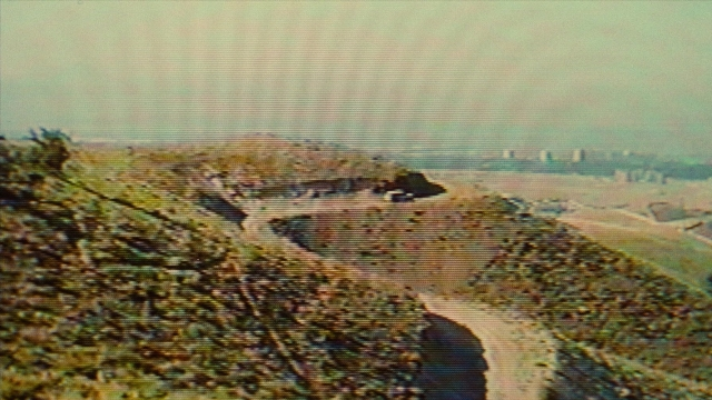 Frame from Ta'm e guilass — human face, running